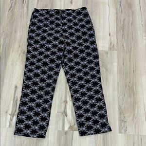 Elegant Black Pants with White Swirl Design